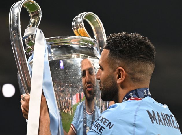 Riyad Mahrez with the Champions League trophy as speculation about a possible transfer continues