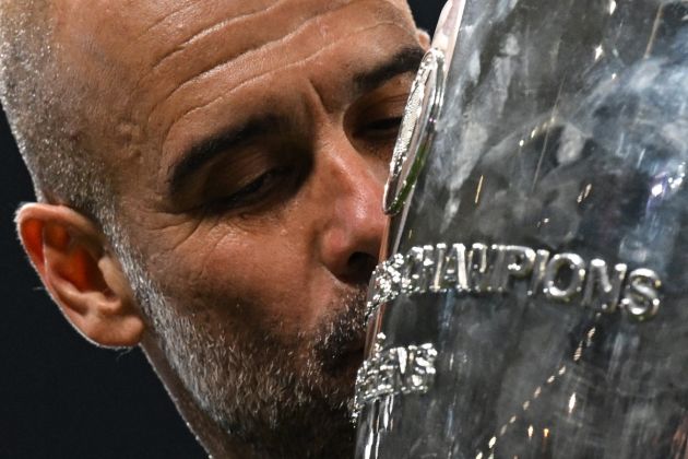 Pep Guardiola kisses the Champions League trophy after victory in Istanbul