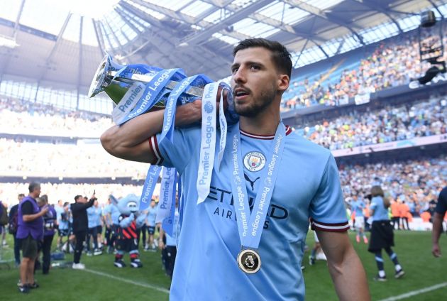 Ruben Dias with the Premier League trophy