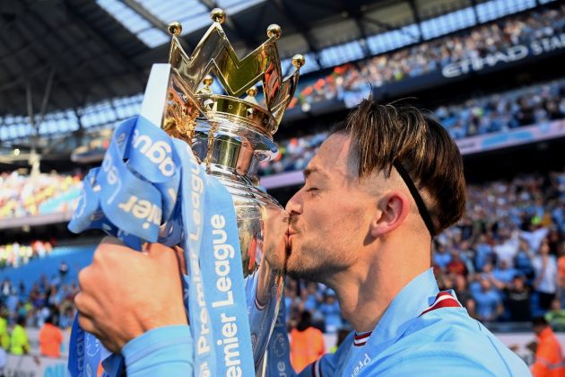 Jack Grealish with the Premier League trophy